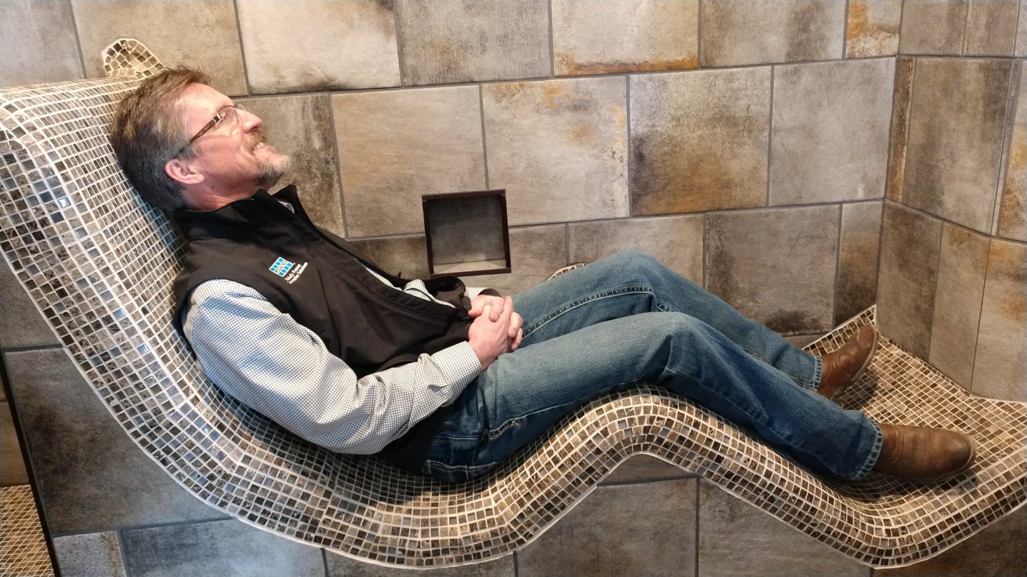 Mike from Laticrete approving the finished custom shower recliner